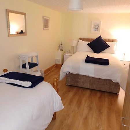 Kents Guesthouse Accommodation Kilmacthomas Номер фото